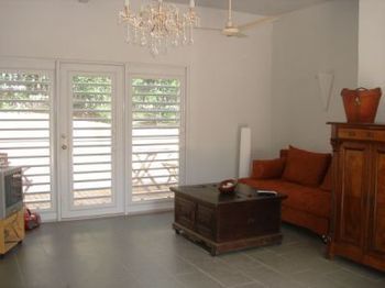 Imagen de la habitación del Hotel Frangipani Apartments. Foto 6