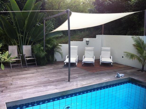 Imagen de la piscina del Hotel Frangipani Apartments. Foto 10