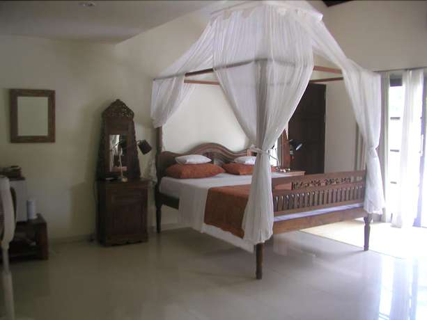 Imagen de la habitación del Hotel Frangipani Beach. Foto 2