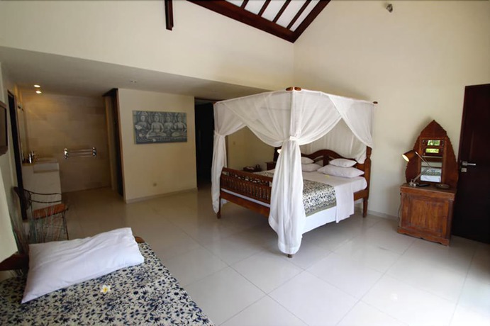 Imagen de la habitación del Hotel Frangipani Beach. Foto 5