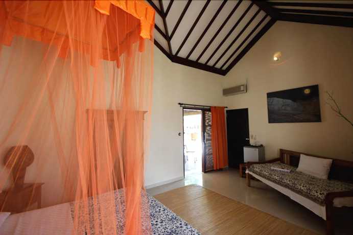 Imagen de la habitación del Hotel Frangipani Beach. Foto 6