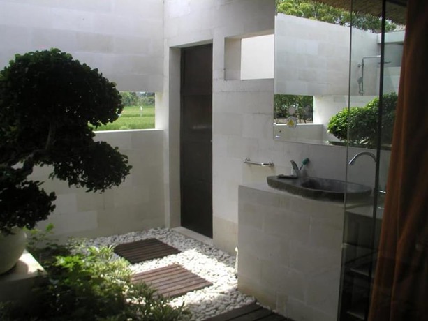 Imagen de la habitación del Hotel Frangipani Beach. Foto 12