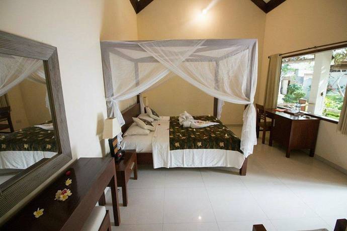 Imagen de la habitación del Hotel Frangipani Beach. Foto 13