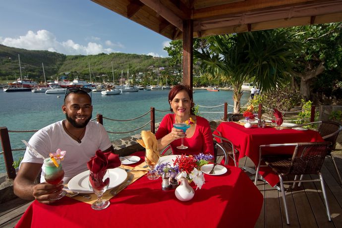 Imagen del bar/restaurante del Hotel Frangipani. Foto 2