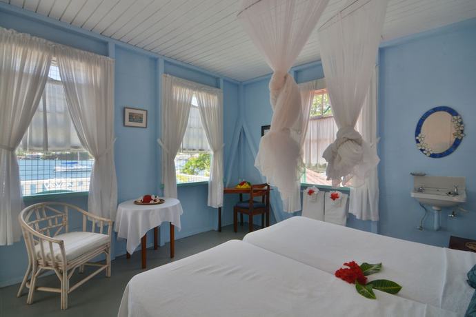 Imagen de la habitación del Hotel Frangipani. Foto 11