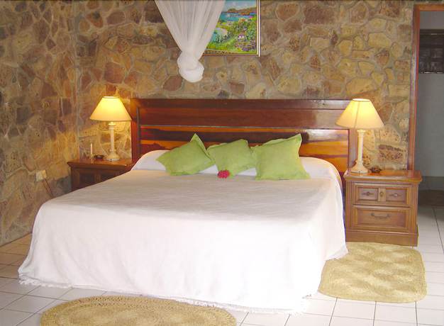 Imagen de la habitación del Hotel Frangipani. Foto 14