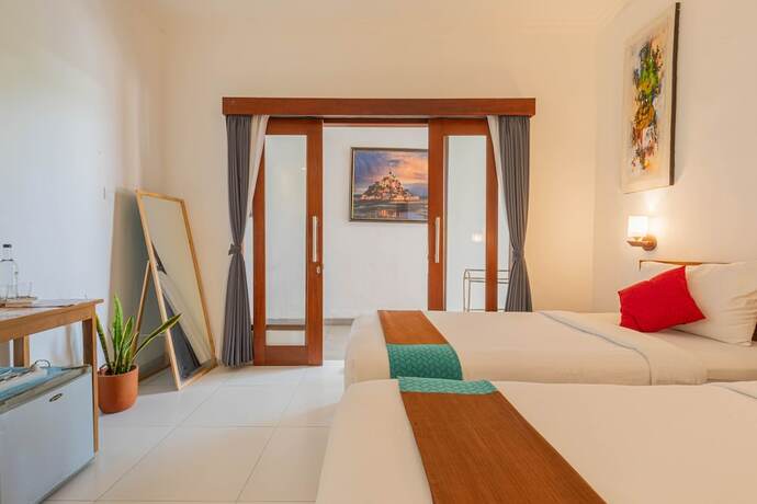 Imagen de la habitación del Hotel Frangipani House and Spa by Ecommerceloka. Foto 17