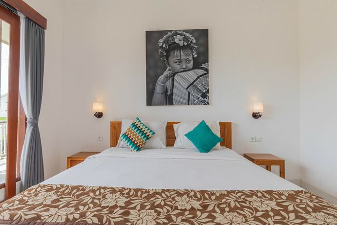 Imagen de la habitación del Hotel Frangipani House and Spa by Ecommerceloka. Foto 19