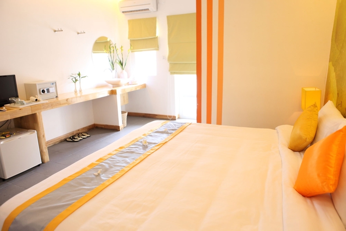 Imagen de la habitación del Hotel Frangipani Living Arts Hotel & Spa. Foto 4