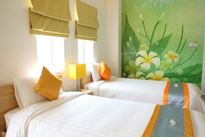 Imagen de la habitación del Hotel Frangipani Living Arts Hotel & Spa. Foto 5