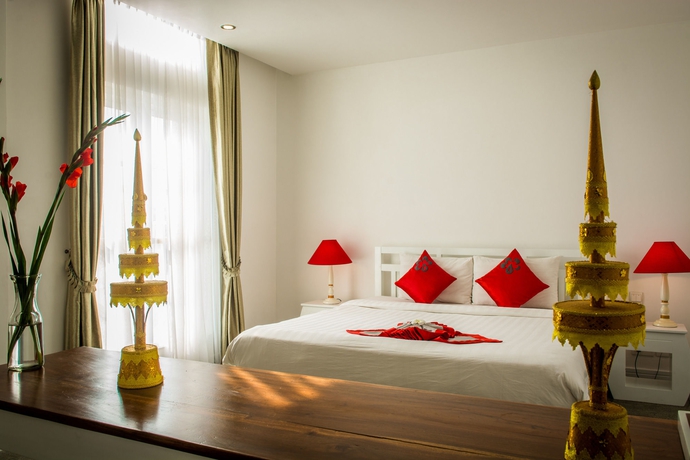 Imagen de la habitación del Hotel Frangipani Royal Palace. Foto 4