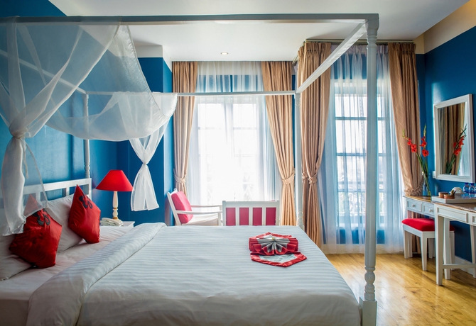 Imagen de la habitación del Hotel Frangipani Royal Palace. Foto 5