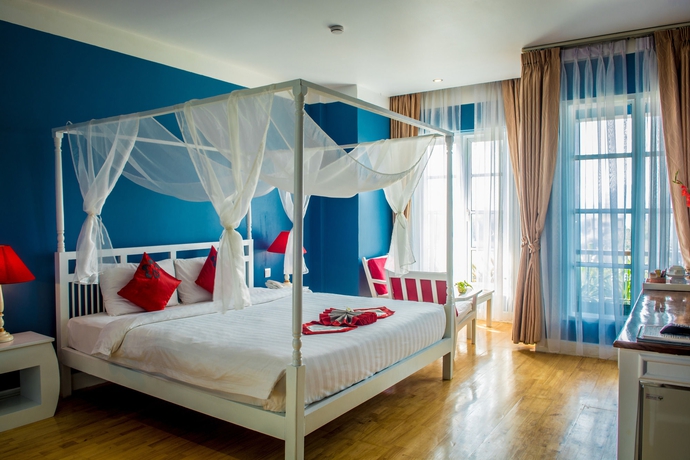 Imagen de la habitación del Hotel Frangipani Royal Palace. Foto 7