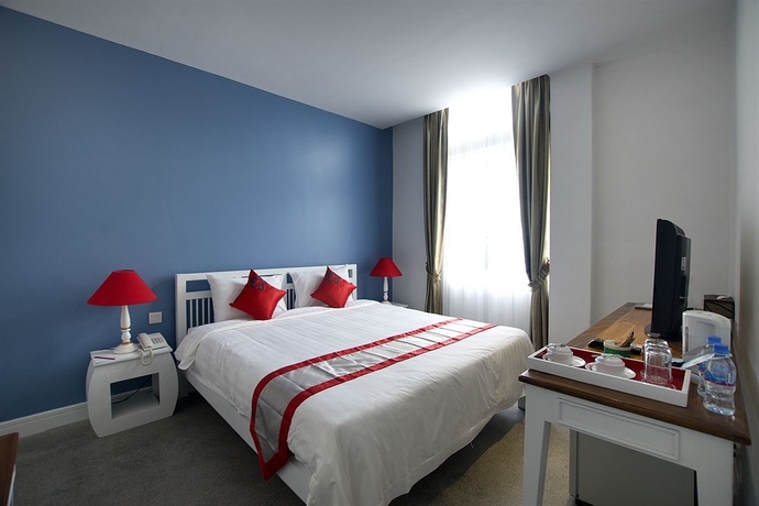 Imagen de la habitación del Hotel Frangipani Royal Palace. Foto 9