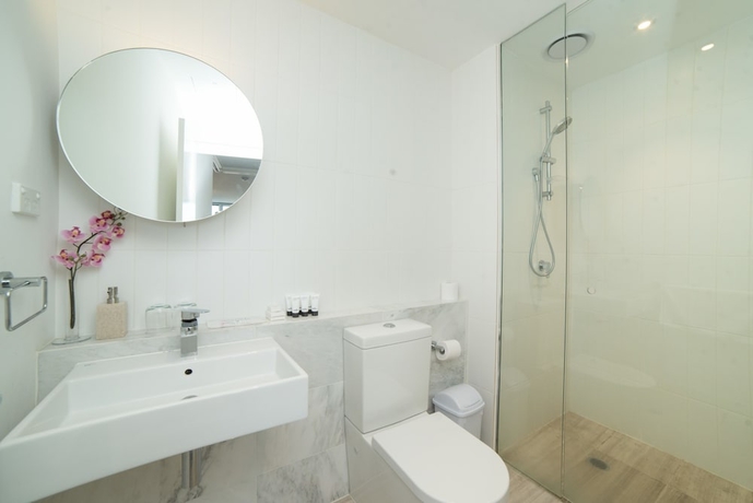 Imagen de la habitación del Hotel Frangipanistays At 589e. Foto 17