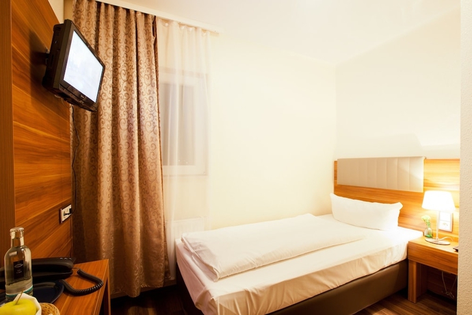 Imagen de la habitación del Hotel Frankfurt Messe. Foto 8