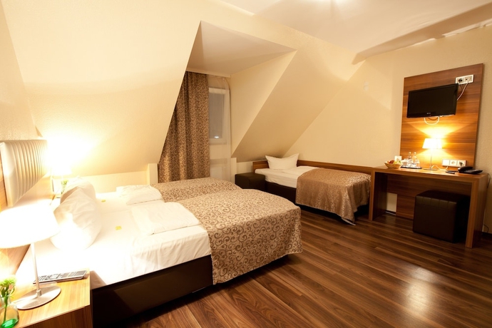 Imagen de la habitación del Hotel Frankfurt Messe. Foto 14