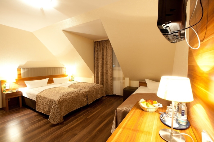 Imagen de la habitación del Hotel Frankfurt Messe. Foto 15