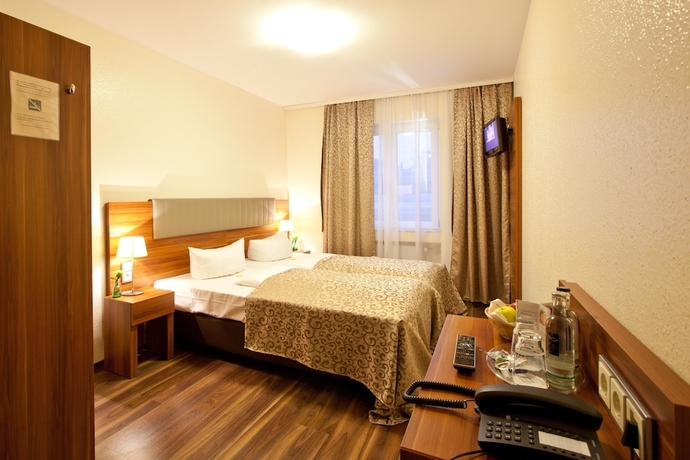 Imagen de la habitación del Hotel Frankfurt Messe. Foto 16