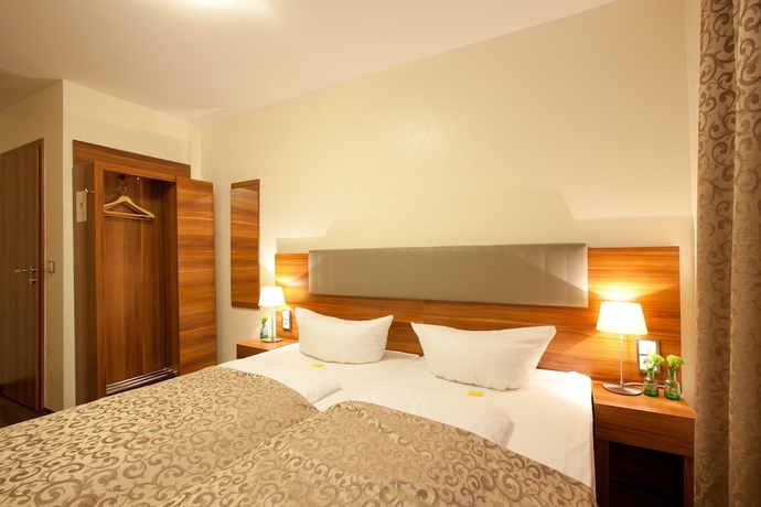 Imagen de la habitación del Hotel Frankfurt Messe. Foto 17