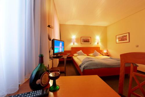 Imagen de la habitación del Hotel Franziskaner, Wurzburg. Foto 10