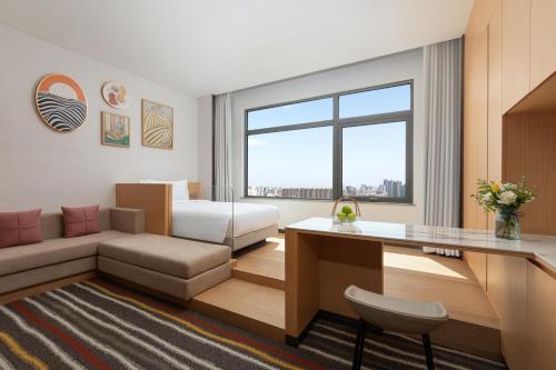 Imagen de la habitación del Hotel Fraser Place Wujiaochang Shanghai. Foto 19