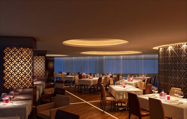 Imagen del bar/restaurante del Hotel Fraser Suites Diplomatic Area Bahrain. Foto 6