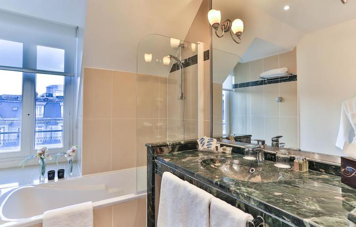 Imagen de la habitación del Hotel Fraser Suites Le Claridge Champs-Elysées. Foto 9