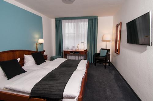 Imagen de la habitación del Hotel Frechener Hof. Foto 8