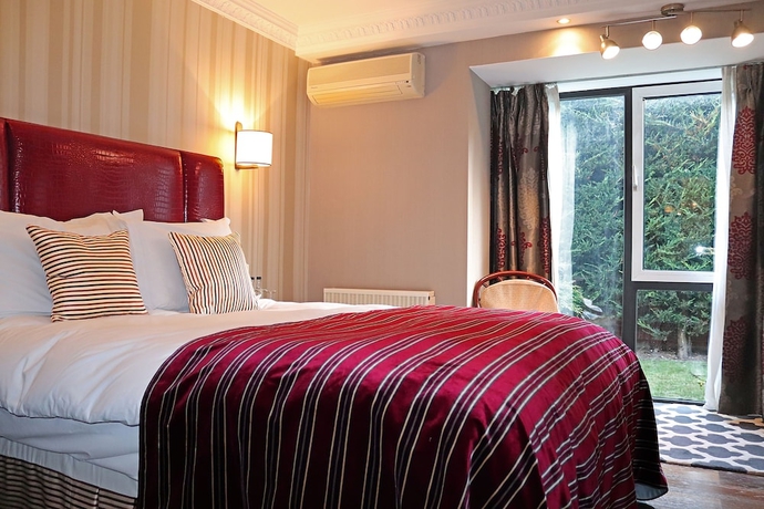 Imagen de la habitación del Hotel Fredrick's Restaurant and Spa. Foto 15