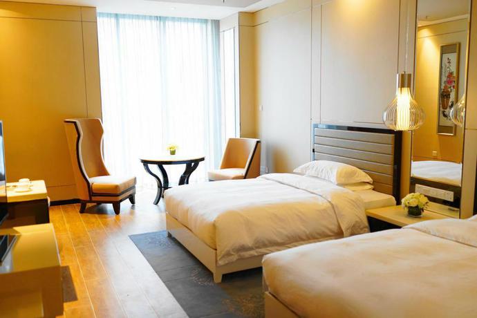Imagen de la habitación del Hotel Free Comfort Holiday Xishan. Foto 2