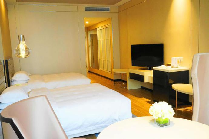 Imagen de la habitación del Hotel Free Comfort Holiday Xishan. Foto 6
