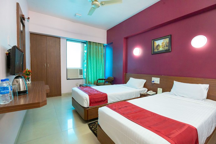 Imagen de la habitación del Hotel Freesia by Express Inn. Foto 2