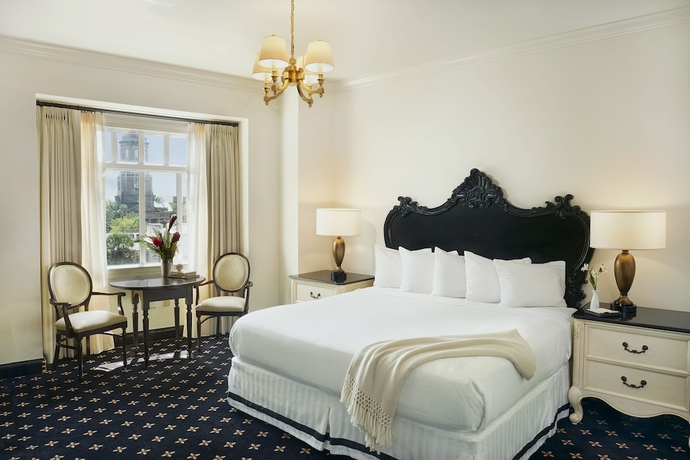 Imagen de la habitación del Hotel French Quarter Inn, Charleston. Foto 11