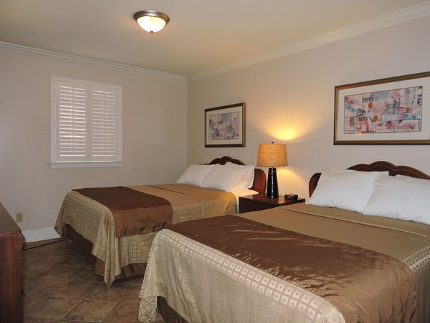Imagen de la habitación del Hotel French Quarter Suites. Foto 5