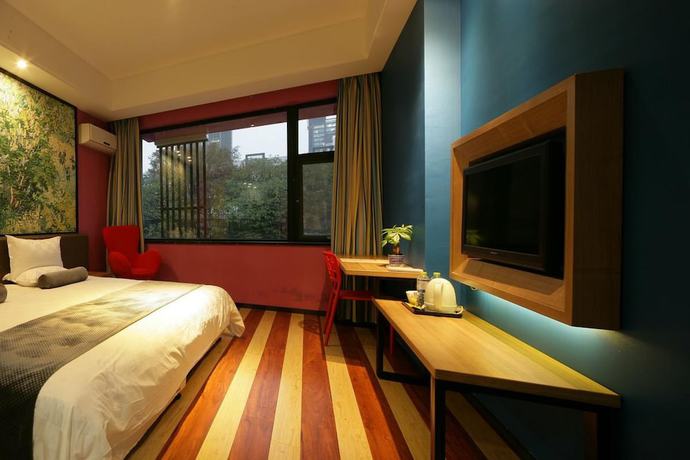 Imagen de la habitación del Hotel Fresh House Huanglong Wantang. Foto 11