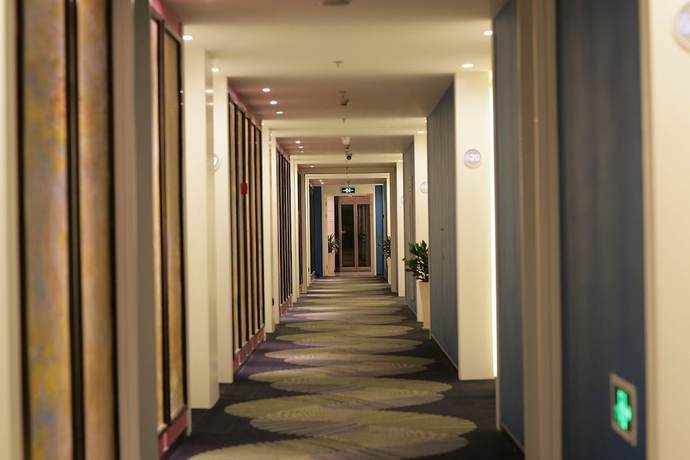 Imagen de los interiores del Hotel Fresh House Huanglong Wantang. Foto 18