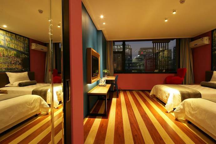 Imagen de la habitación del Hotel Fresh House Huanglong Wantang. Foto 13