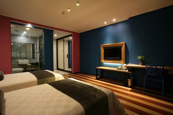 Imagen de la habitación del Hotel Fresh House Huanglong Wantang. Foto 15