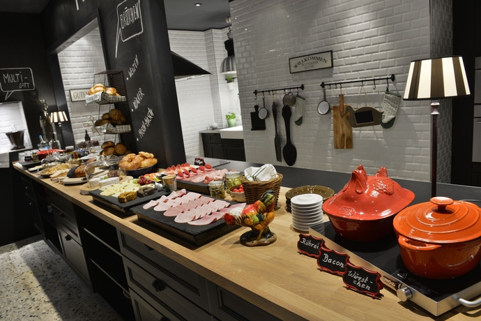 Imagen del bar/restaurante del Hotel Friends Düsseldorf Downtown. Foto 7