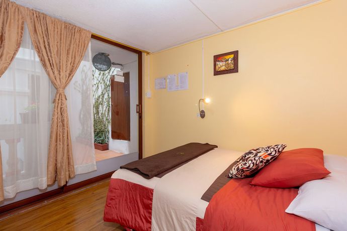 Imagen de la habitación del Hotel Friends and Rooftop. Foto 2