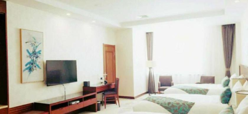 Imagen de la habitación del Hotel Friendship Convention Center. Foto 8