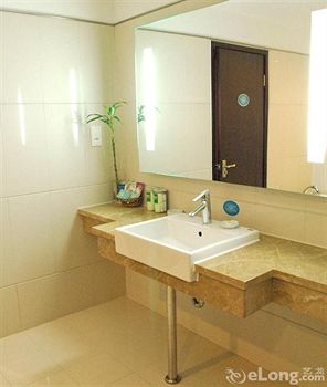 Imagen de la habitación del Hotel Friendship, DALIAN. Foto 5