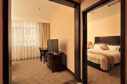 Imagen de la habitación del Hotel Friendship, DALIAN. Foto 14
