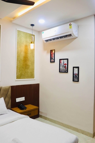 Imagen de la habitación del Hotel Friendship Inn, Indore. Foto 11