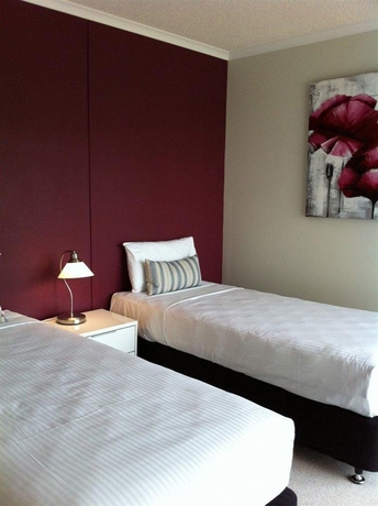 Imagen de la habitación del Hotel Frisco Apartments. Foto 4
