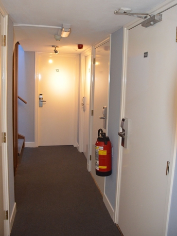 Imagen de los interiores del Hotel Frisco Inn. Foto 12