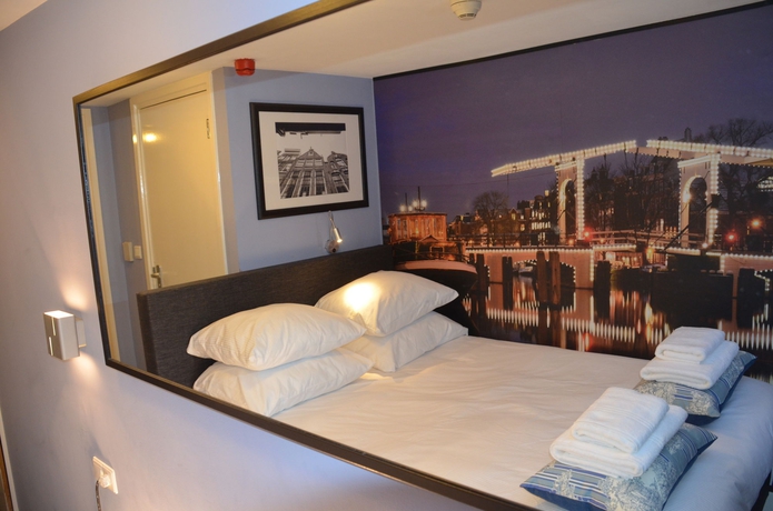 Imagen de la habitación del Hotel Frisco Inn. Foto 4