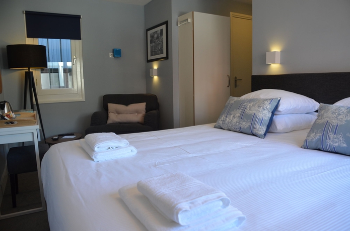 Imagen de la habitación del Hotel Frisco Inn. Foto 5