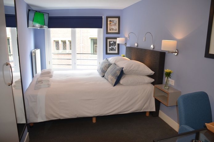 Imagen de la habitación del Hotel Frisco Inn. Foto 6